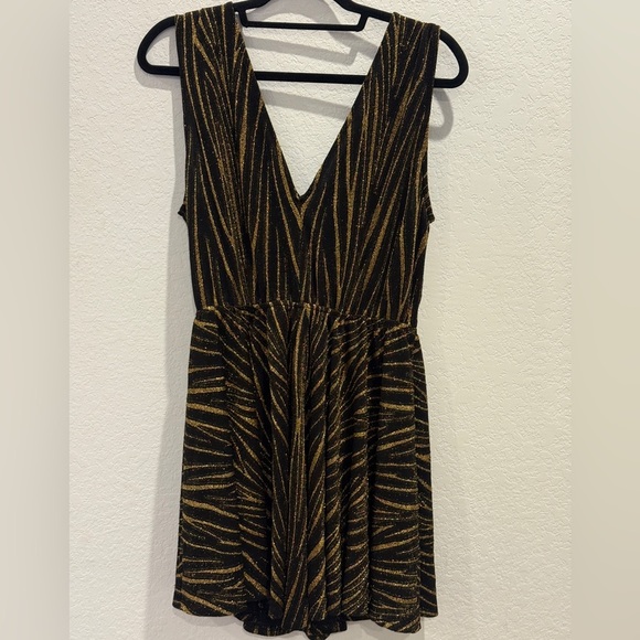 ANDREA Glam Black and Gold Fit and Flare Mini Dress - Picture 2 of 5